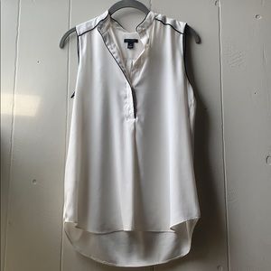 Buttoned white top with black trim